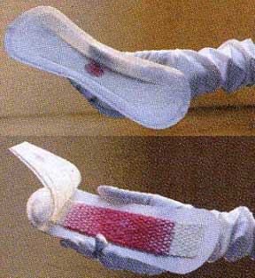 Pads in Red Bandage. the Concept of Feminine Personal Hygiene